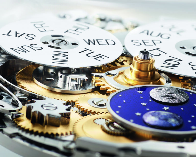 Rolex Perpetual Padellone : la porte refermée en 1953 vient de se rouvrir Macro des rouages du calendrier annuel : disques du jour et du mois, et lunes en météorite sur émail bleu